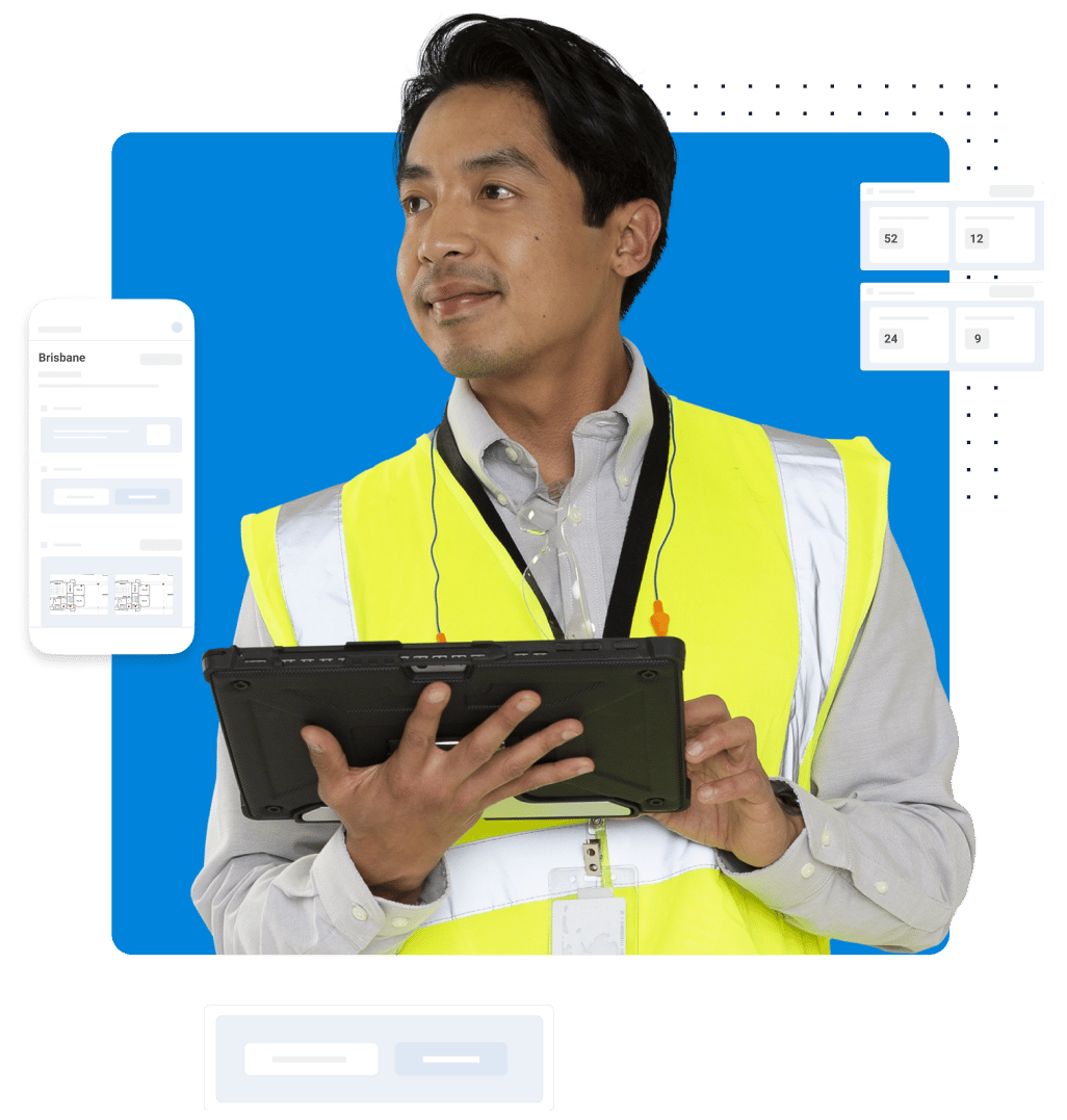 man in construction PPE working on tablet device with Bluebeam construction software UI in the background