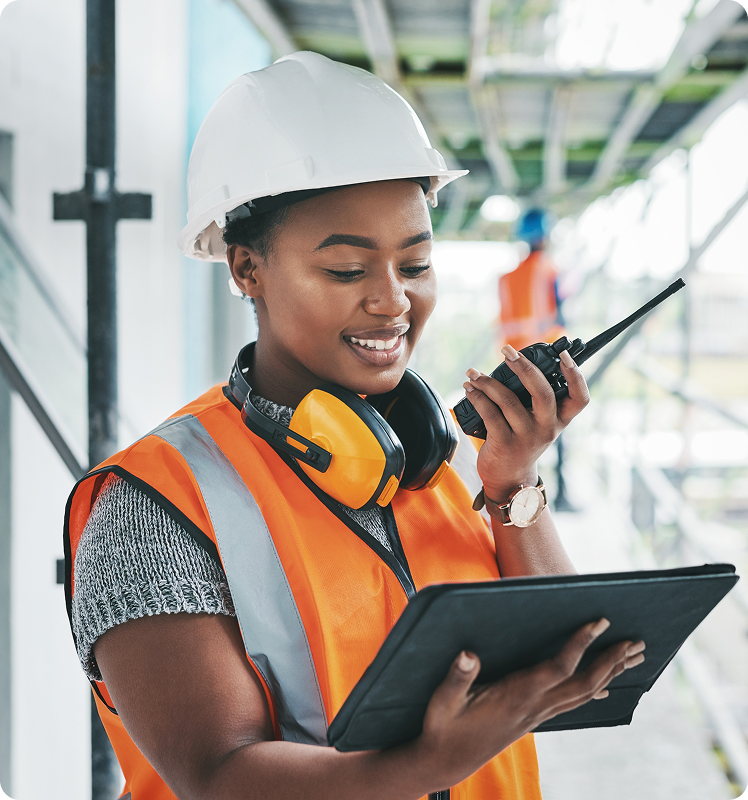 Construction worker holding an ipad