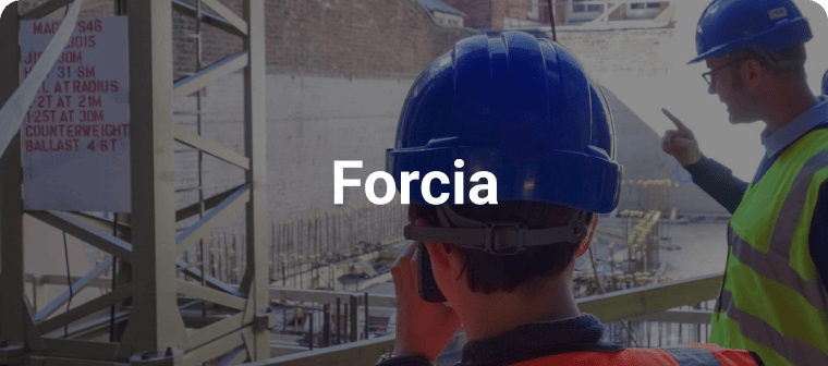 Forcia construction workers looking over jobsite