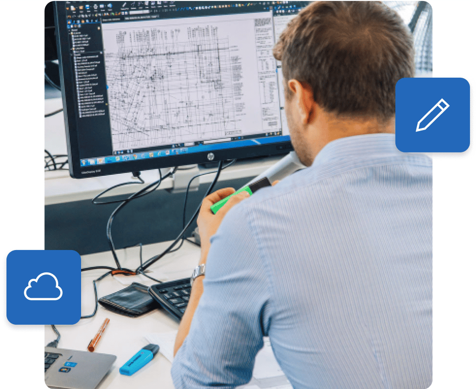 Hombre trabajando en la oficina con el software de construcción Bluebeam