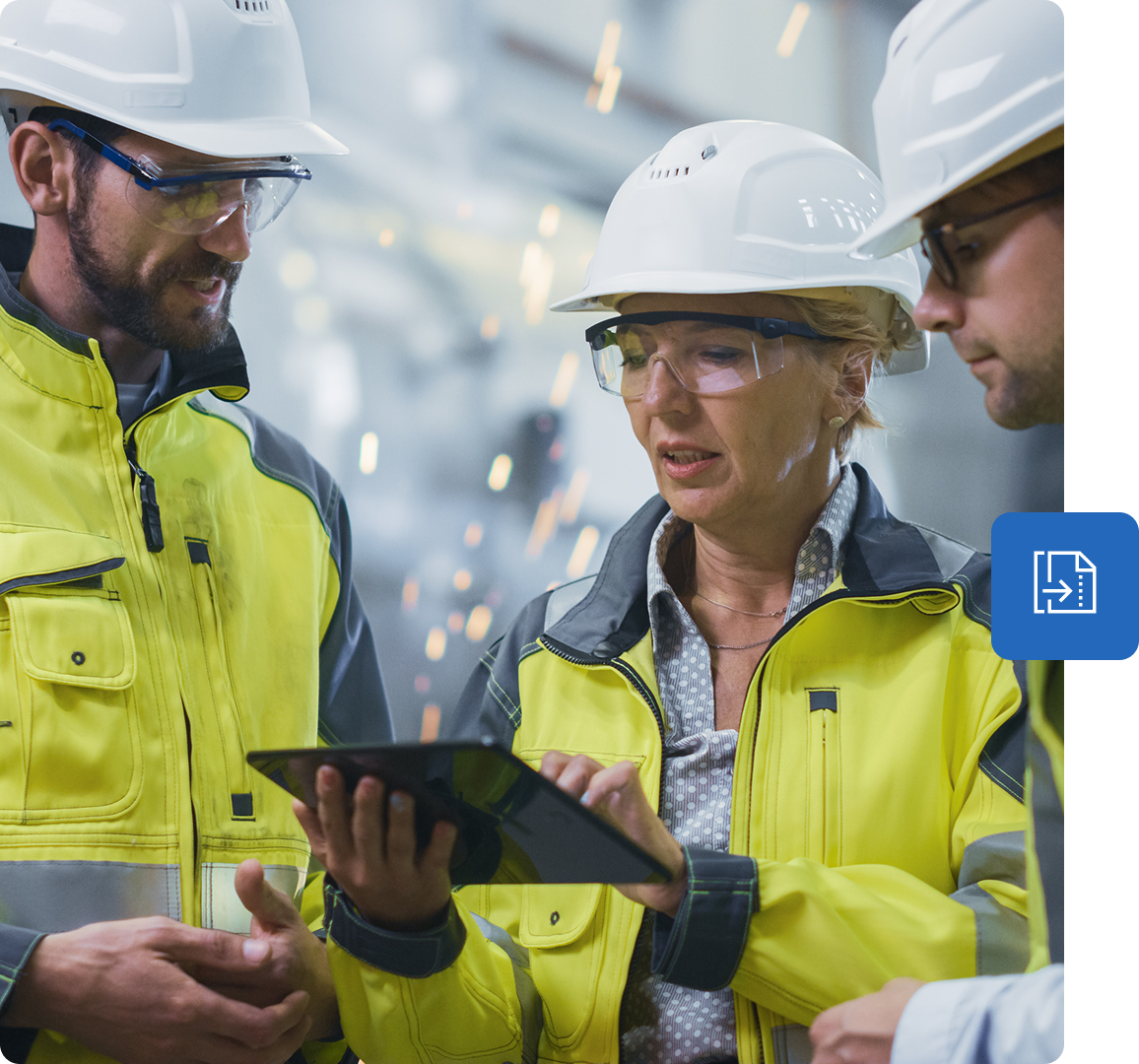 Three construction workers look at tablet together