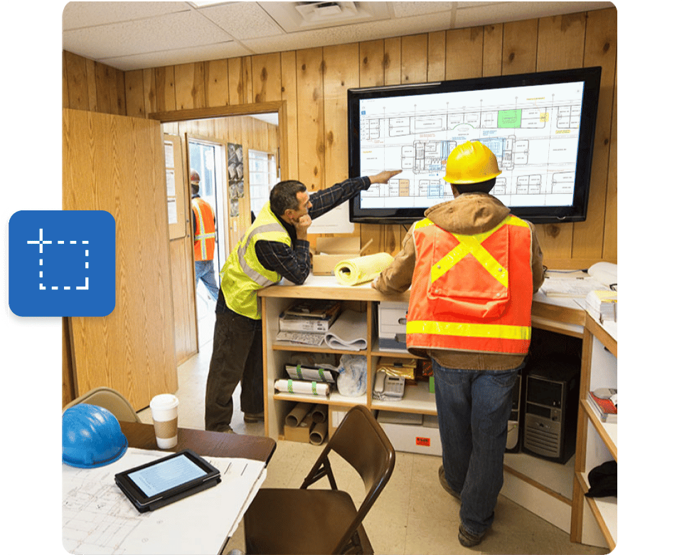 ingeniører i en byggtrailer som ser på Bluebeams programvare for konstruksjon av bygg og anlegg