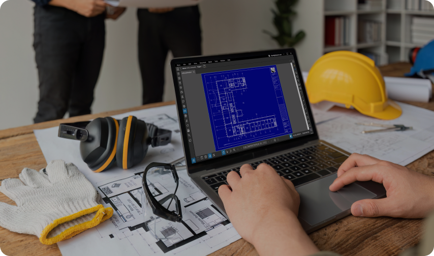 Revu on a laptop at a construction office