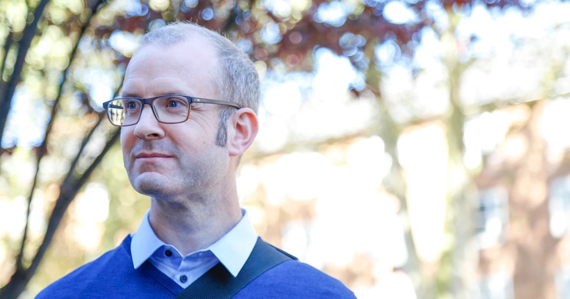 man wearing glasses outside