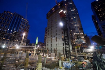 office skyline and construction project at night