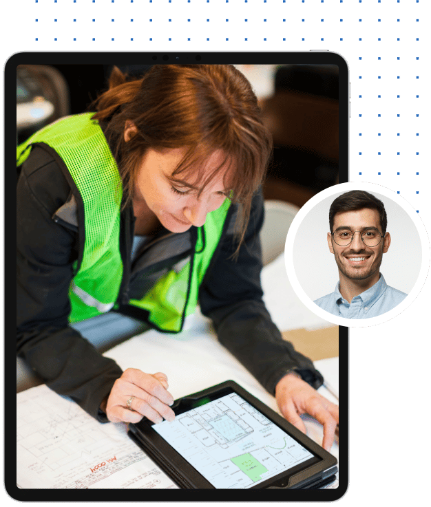 Construction worker viewing Bluebeam Cloud software on tablet