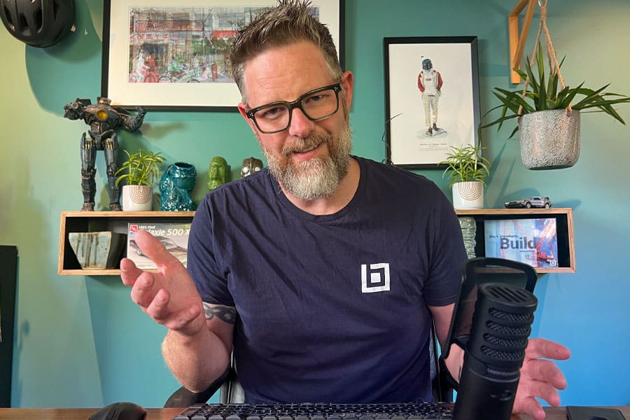 Shanoc Halliday, Bluebeam’s Enterprise Customer Success Manager, at his desk