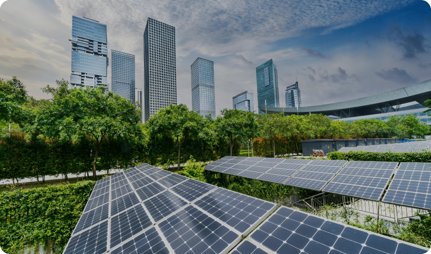 Solar panels with skyscrapers in the distance