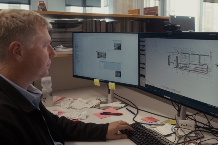 ZGF Principal Nat Slayton using Bluebeam at his desk