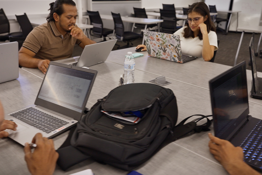 Fresno State students working on Bluebeam Revu together at a table
