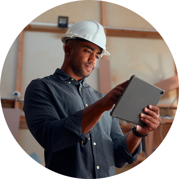 Construction worker using tablet