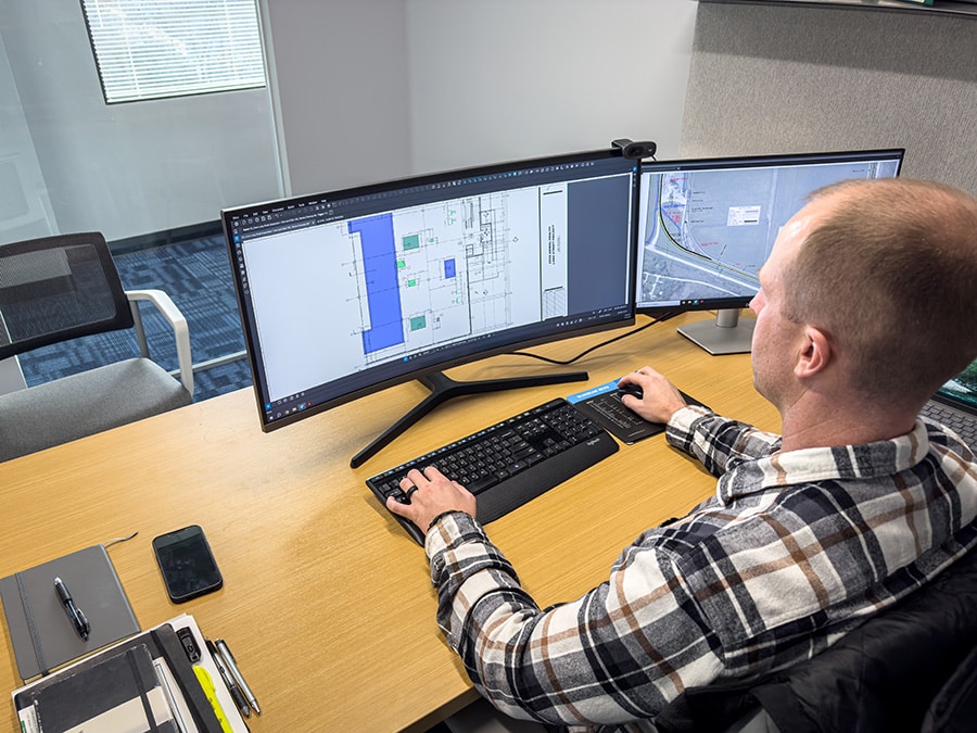 Christopher Leheney, Musselman & Hall’s pre-construction manager, works on quantity estimations in Bluebeam. 